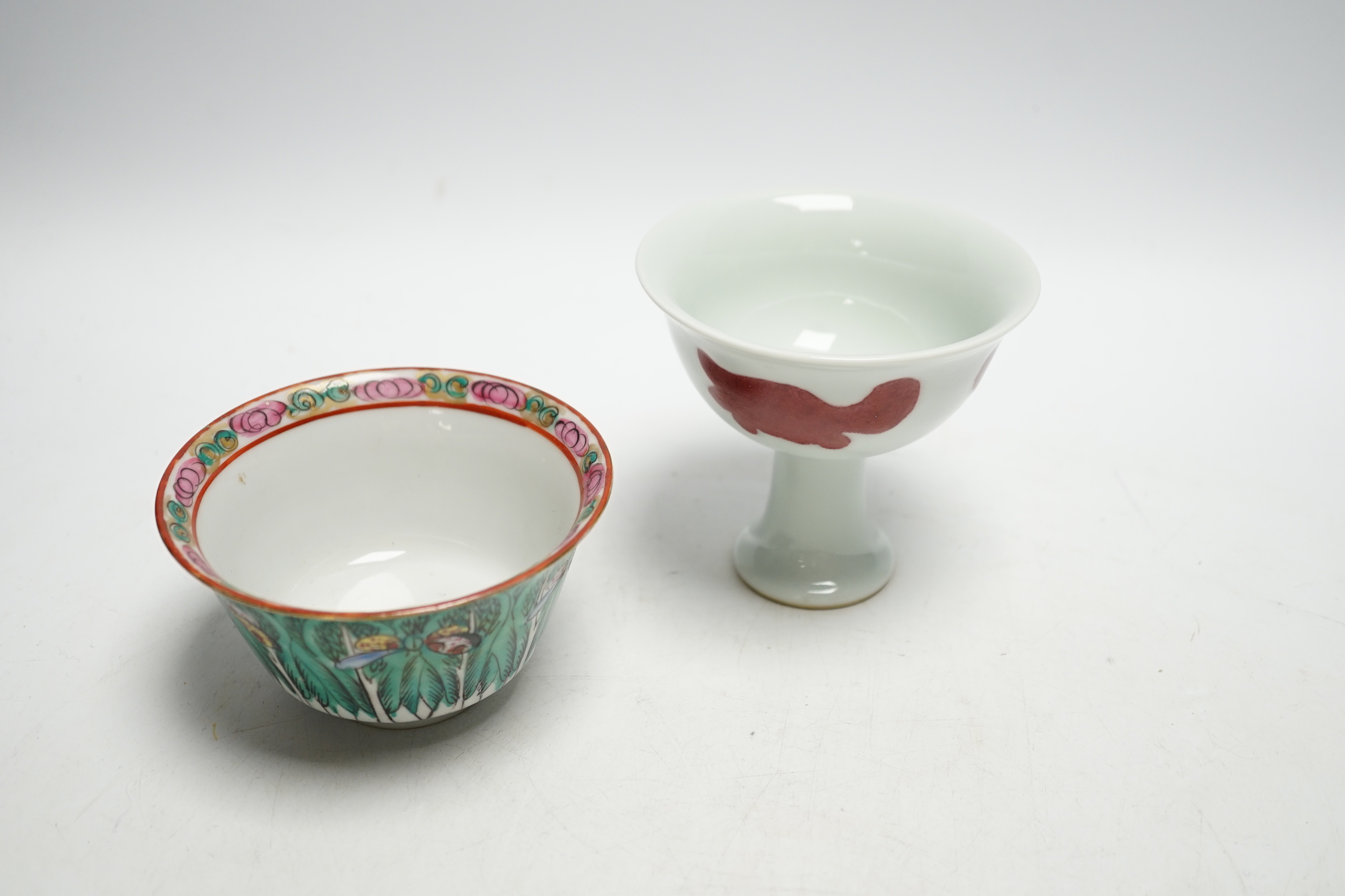 A Chinese tea bowl and stand, a white glazed horse and a pedestal bowl, tallest 9cm high